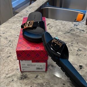 Tory Burch Black Slides with Gold Emblem